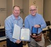 Don Bowers (right) receives the award from Mike Pischke, Assistant Executive Director of the National Board of Boiler and Pressure Vessel Inspectors during a Code meeting on August 8-9 in Columbus, Ohio