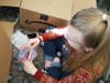 Katelyn O'Connor packaging more than 200 dental kits for the Hospital for the Homeless in Feb 2018
