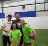 Twelve-year-old Hayden Gardner, right, is helping plan Goals for Grace 2019 as a volunteer along with her younger sister Hayley. They're joined by Harford Sports Performance Center Owner Coach Danny Taylor and Celebrity Goalie Phil Saunders.