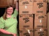 We Cancerve Board Member Ashlee Brockwell, Patterson Mill High School freshman, stands with 1,000 of 1,600 items she individually secured for this year's Breakfast Bags Bonanza..