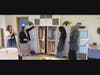 Grace Callwood, 17, founder, We Cancerve Movement, Inc., shows off new donated clothes in the Threads of Hope closet May 26 at an elementary school in Aberdeen.