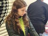 QUALITY CONTROL: We Cancerve Board Member Gianna Sabatini, 14, helps check snack bags to ensure all contained the right amount of items.