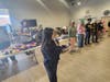 We Cancerve Board Member Gloria Park, 15, shares background information on each of the organizations scheduled to receive snack packs.