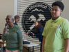 Deidre Sumpter, president of Xi Delta Omega Chapter of Alpha Kappa Alpha Sorority, Inc., and Nael Lewis-Shakur, 14, lead for We Cancerve's "Snack Attack" project share welcoming remarks with the 60+ volunteers.