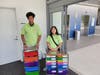 Nael Lewis-Shakur, 14, and Gloria Park, 15, prepare We Cancerve's Back-to-School Buggy for Sinai Hospital pediatric patients receiving cancer treatment