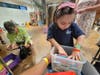 At the Ronald McDonald House in Baltimore, patients and their siblings shop for schools supplies from We Cancerve's Back-to-School Buggy