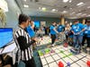 Vex robotics competition among the participating schools.
