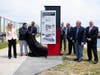 Lisa Wieland, CEO of Massachusetts Port Authority; Senator Nick Collins; Tim Pappas, President of Pappas Enterprises; Mark McGowan, VP, Boston Head of Development at Oxford Properties Group; Rep. David Biele; Cllr. Michael Flaherty; and Cllr. Ed Flynn.