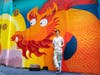 Thai artist and landscape architect Ponnapa Prakkamakul creates a vibrant, temporary art mural, titled Where We Belong, celebrating Chinatown’s culture, community stories, and history.