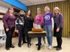 From left are Eileen Hendriksen; Marion Morris; Lisa Miller of Temple Sinai; Marianne Sciucco, local author and founder of AlzAuthors; Debbie Ackerman, Caregiver Support Group Facilitator; and Donna Davies.