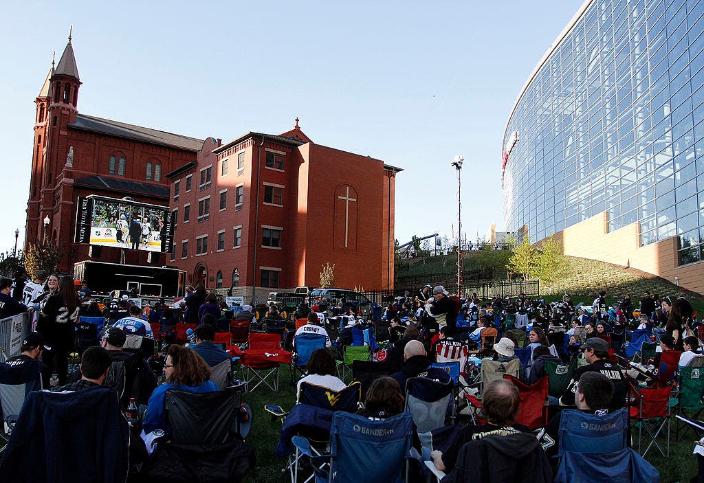 PEns fans watch a playoff game in this big screen file photo.