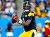 Pittsburgh Steelers quarterback Dwayne Haskins plays against the Carolina Panthers during the first half of a preseason NFL football game in August 2021.