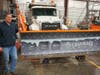 Cranberry public works employee Jeff Richmond with the newly-named snowplow.