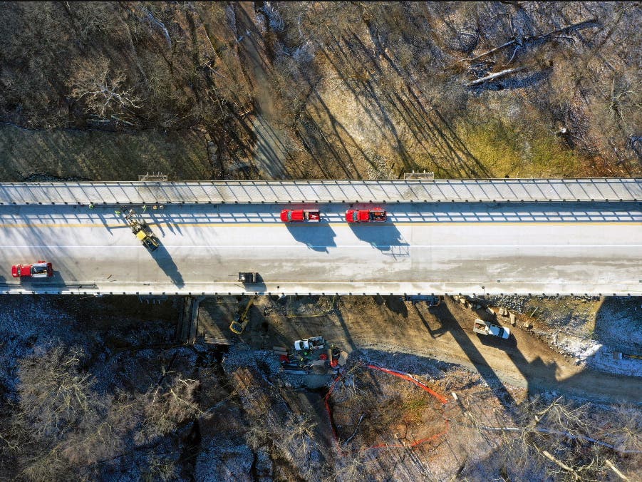 This aerial image taken with a drone, shows the new Fern Hollow Bridge, that is being dedicated Wednesday, Dec. 21, 2022 in Pittsburgh. 