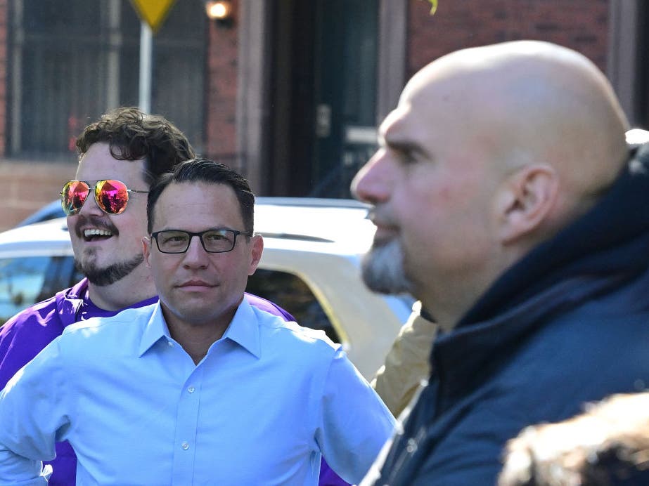 Pennsylvania Gov. Josh Shapiro and U.S. Sen. John Fetterman while both were campaigning for their respective positions last year.