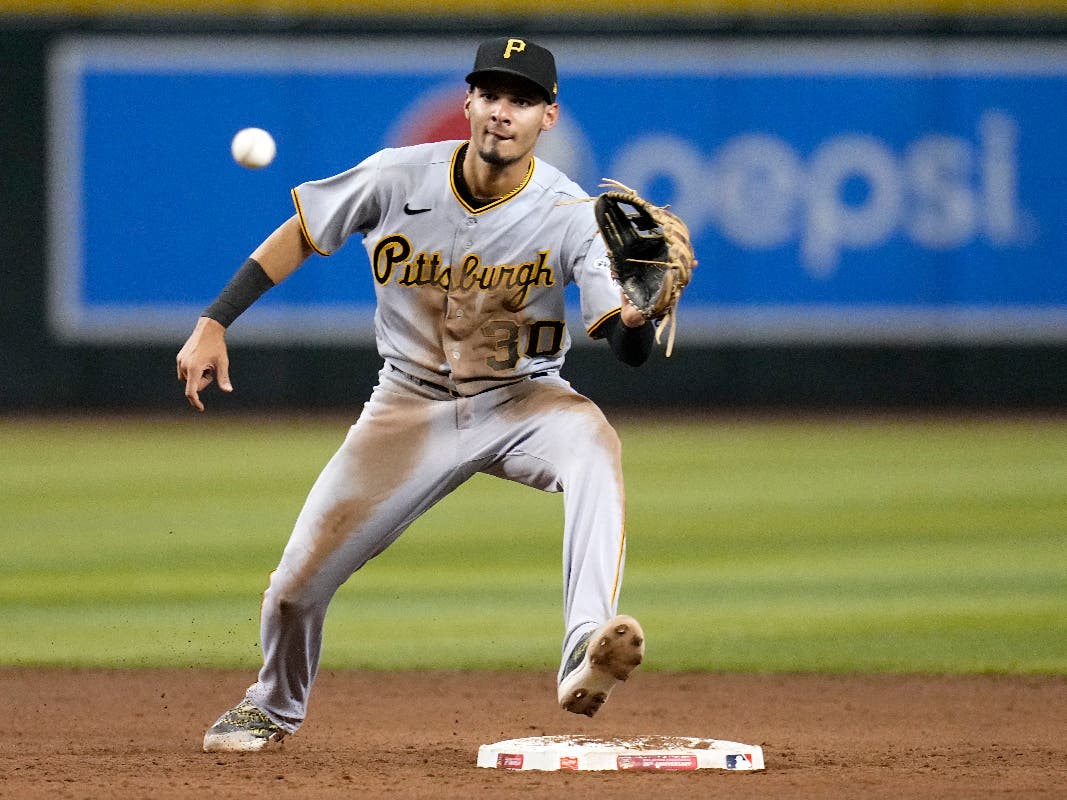 Former Pittsburgh Pirates shortstop Tucupita Marcano takes a throw down to second base during the fifth inning of a baseball game against the Arizona Diamondbacks, July 7, 2023, in Phoenix.