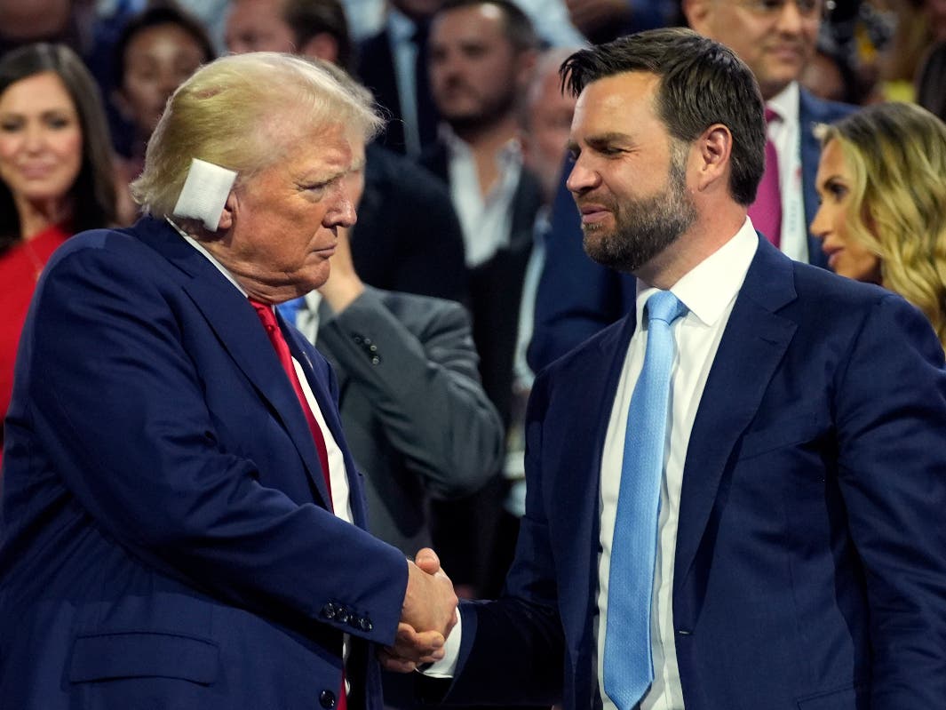 Republican presidential candidate former President Donald Trump and Republican vice presidential candidate Sen. JD Vance, R-Ohio, attend the first day of the Republican National Convention, Monday, July 15, 2024, in Milwaukee. 