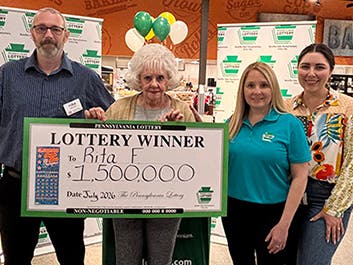 Giant Eagle Team Leader Mike Swarek, PA Lottery Winner Rita Franczyk, PA Lottery Western Regional Sales Manager Victoria Holman, Giant Eagle Public Relations Manager Jannah Drexler
