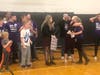 Sweeney and her family were present at an assembly where she was presented with a check to help cover treatment expenses