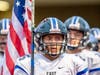 The team selects a “Flag Carrier” to carry the U.S. Flag into the stadium with the team.