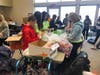 All of the volunteers gathered at the Lemont Township Community Center Nov. 10 to sort, dry and organize thousands and thousands of bottle caps.​