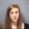 Sarah Benain, 25, of the 13200 block of West Oakwood Drive, was charged with a hate crime, disorderly conduct, resisting arrest, battery and three counts of aggravated battery to a police officer.