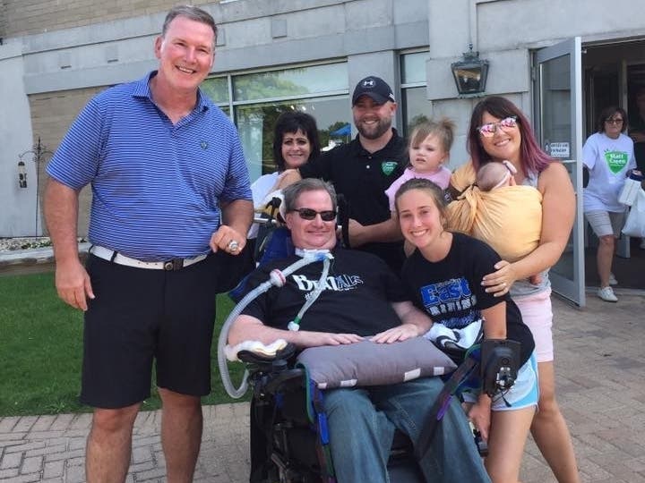 Blackhawks National Anthem singer Jim Cornelison, Matt Creen, Lynn Creen, Matthew Creen, Betsy Creen, Fiona Creen, Brittany Creen, and baby Audrey Creen.
