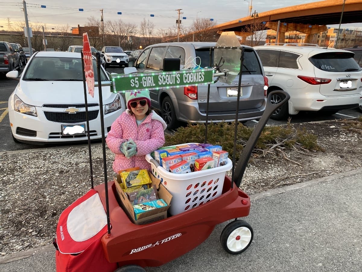 Evelyn said her dad created a wagon with lights and signs, and she pulled it around when she sold her cookies. 
