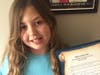  Manhattan residents 10-year-old Amber Smith and 11-year-old Matthew Cernauskas both have childhood apraxia of speech, which causes children to have difficulty learning to speak. 