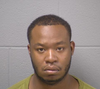 Jamelle McBride, 32, of Homer Glen, has been charged with defrauding a financial institution, identity theft and aggravated unlawful use of weapon.