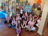 Sandy Sotzen discusses her book "Why Do They Do That?" with Girl Scout Troop 75643.