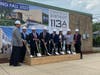Superintendent Anthony McConnell and board members Kevin Collins, Al Malley, Brian Bushnell, Damon Ascolani, Patrick Kerrigan, Cindy Kelly and Bethany Martino break ground for the Central project.
