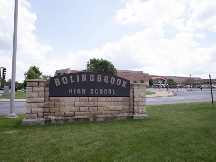 After his professional football career, the Bolingbrook Police Department hired John as a patrolman.