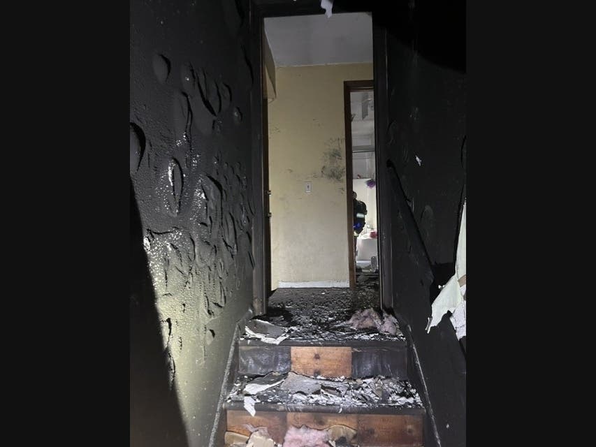 The fire was reported at 6:54 p.m. Sunday on Washington Street.