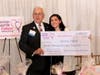 Alexia Palm of Salem receiving the David J. Solimine Sr. Honorary Scholarship from Dave Solimine Sr.