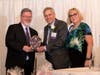 Dr. Joel Schwartz receiving the Hope Begins Here Award from BNCA VP Kevin McCarthy and President Susan McCarthy