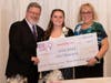 Erin Kidd of Peabody receiving the BNCA Board Scholarship from BNCA VP Kevin McCarthy and President Susan McCarthy