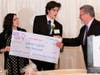 Jared Cepiel of Salisbury receiving the Rising Star Scholarship from Dr. Carmela Mancini and Kevin McCarthy