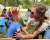 Cobb parent admires her son's handiwork. He'd just made a nature crown.