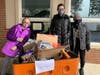 Morristown Girl Scouts pose with a cart filled with food and supplies after the drive-thru food drive that benefited area residents.