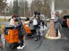 Older members of Morristown Girl Scouts worked together to unload 1,750 pounds of food and supplies for area residents.