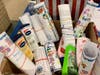 Pen pal letters and lotions from Daisy Girl Scout Troop 98191 await delivery to the homeless friends of Jane Devlin and Wayside Well.