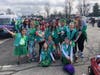 Morristown Area Girl Scout Junior Troop 97425 celebrates at the 2022 Morristown St. Patrick's Day parade.