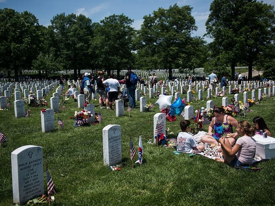 Laying wreaths on the graves of fallen soldiers is a revered Memorial Day tradition.
