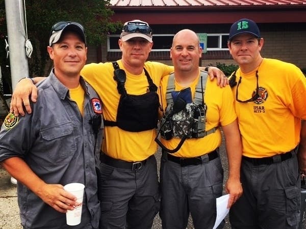 Four Davidson firefighters volunteering with hurricane efforts are expected to remain in eastern North Carolina through the weekend.