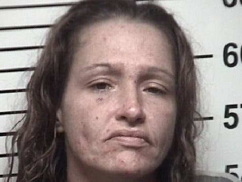 Melissa Ann Brown, 37, of Statesville, was charged with breaking into a vending machine, the Iredell Sheriff's Office said.