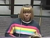 Police are hoping someone in the community recognizes this man, who they say is wanted for robbing a bank wearing a wig.