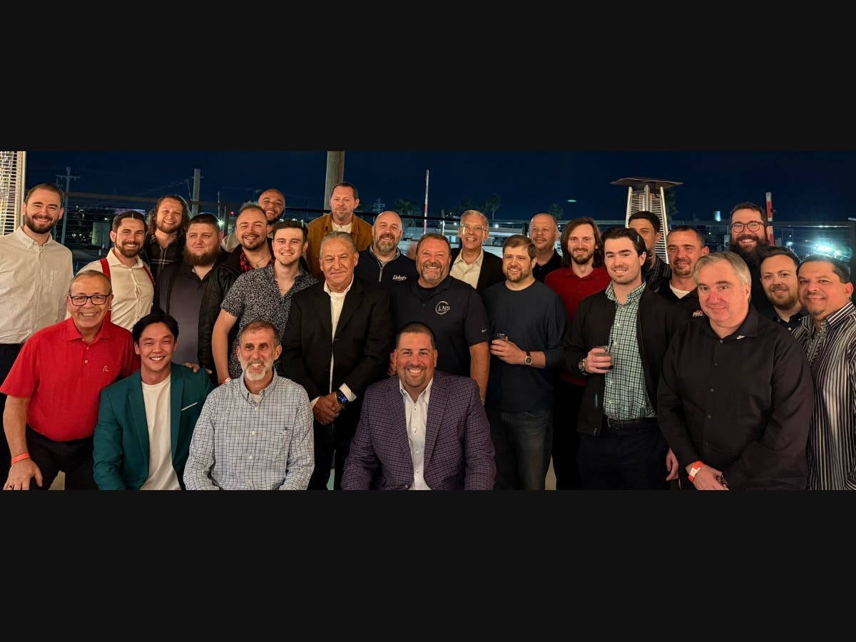 The new Dart team celebrates the merger