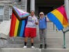 Pictured: MLK staff members Mirasia Cassese (left) and Melanie Saunders (right) participated in the June 11th Pride flag-raising ceremony at Newport City Hall.