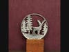 Roxann Kesterson of Anchorville, MI, creates hand-carved coins and jewelry from real currency.